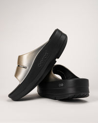 Side view of OOmega OOahh Luxe platform slide with elevated sole and comfort rocker footbed