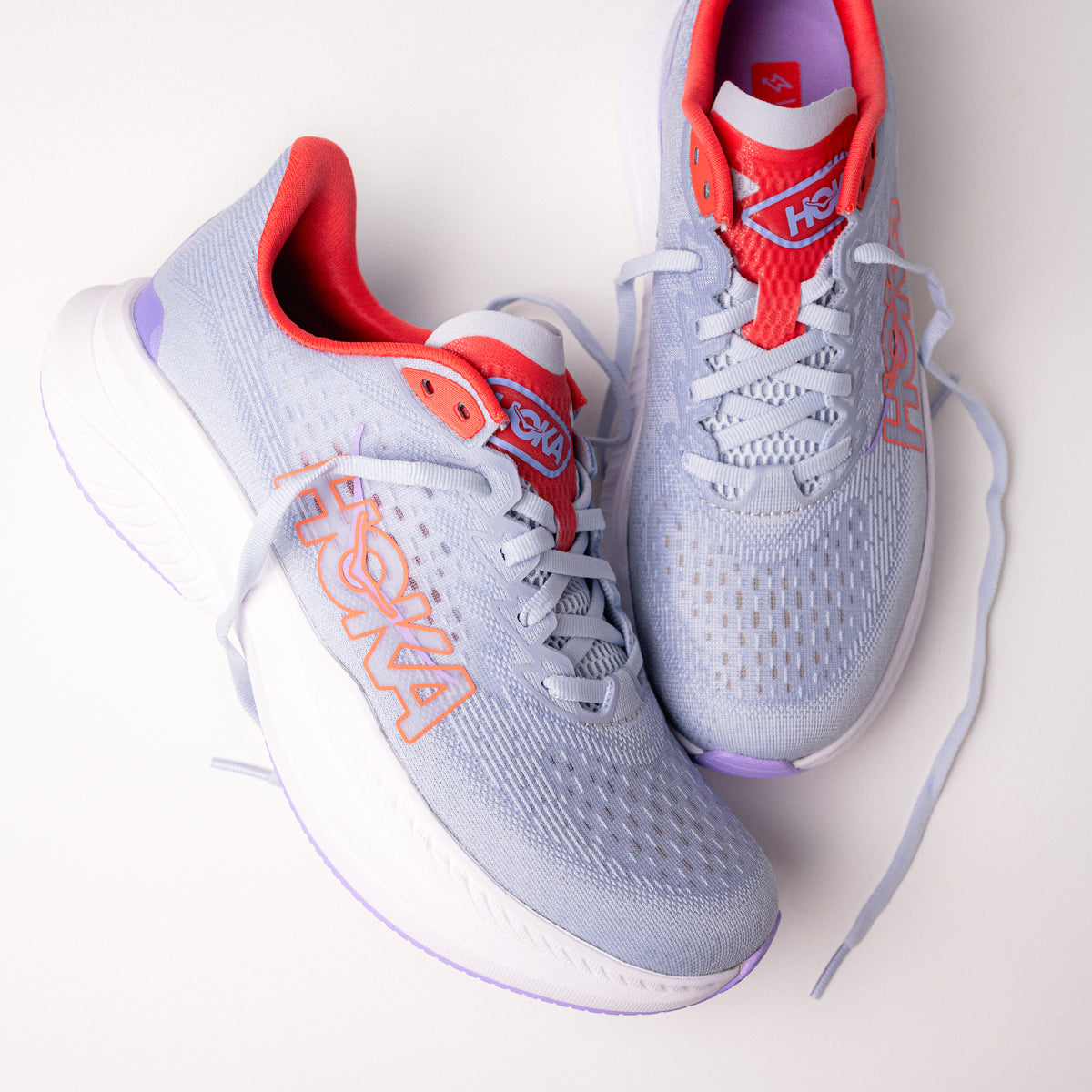 Full view of Women's HOKA Mach 6 in Pale Dusk/Gull on white background.