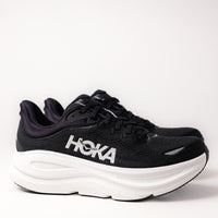 Side view of Men's HOKA Bondi 9 Running Shoe in Black/White