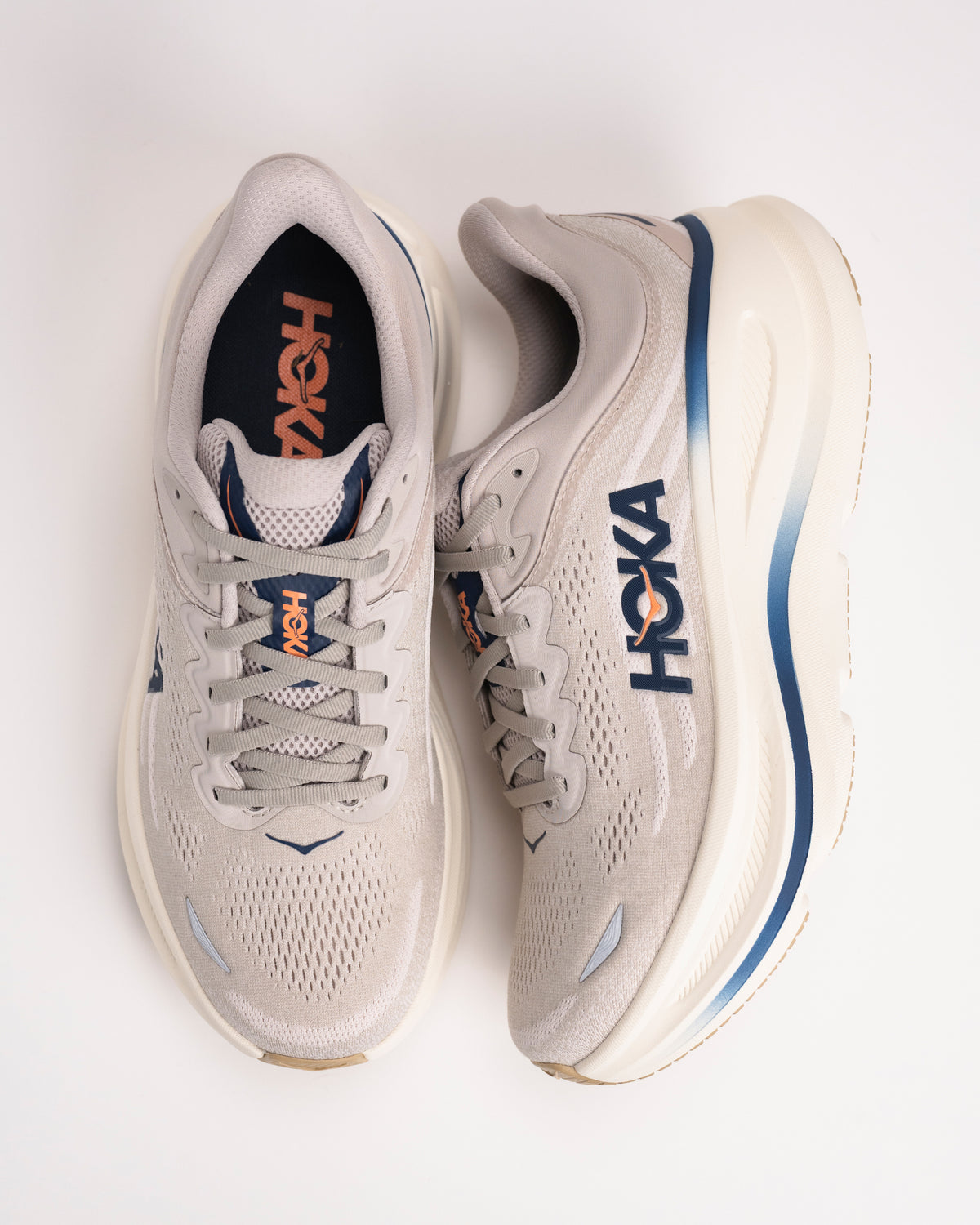 Top-down and Side view of Men’s HOKA Bondi 9 with engineered knit upper, lace detail, and showing cushioned support design