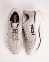 Top-down and Side view of Men’s HOKA Bondi 9 with engineered knit upper, lace detail, and showing cushioned support design