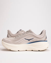 Side view of Men’s HOKA Bondi 9 in Stucco/Grout showing high-stack cushioned midsole