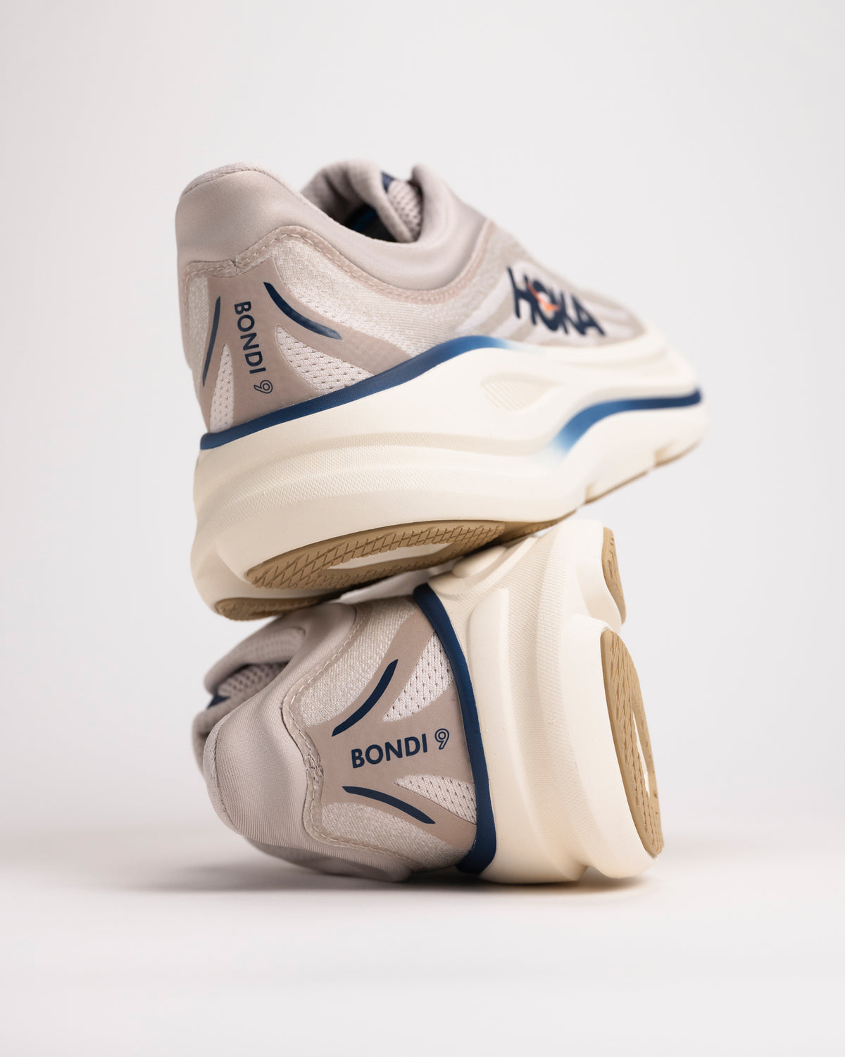 Heel detail of Men’s HOKA Bondi 9 in Stucco/Grout showing cushioned support design