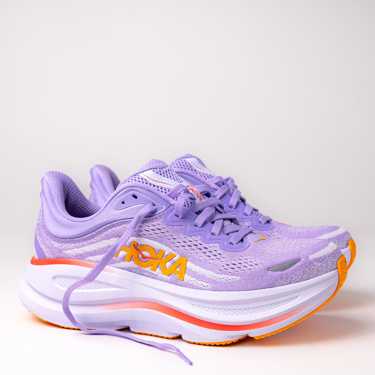 Side profile of Women's HOKA Bondi 9 Running Shoe in Aster Flower/Starlight Glow