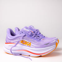 Side profile of Women's HOKA Bondi 9 Running Shoe in Aster Flower/Starlight Glow