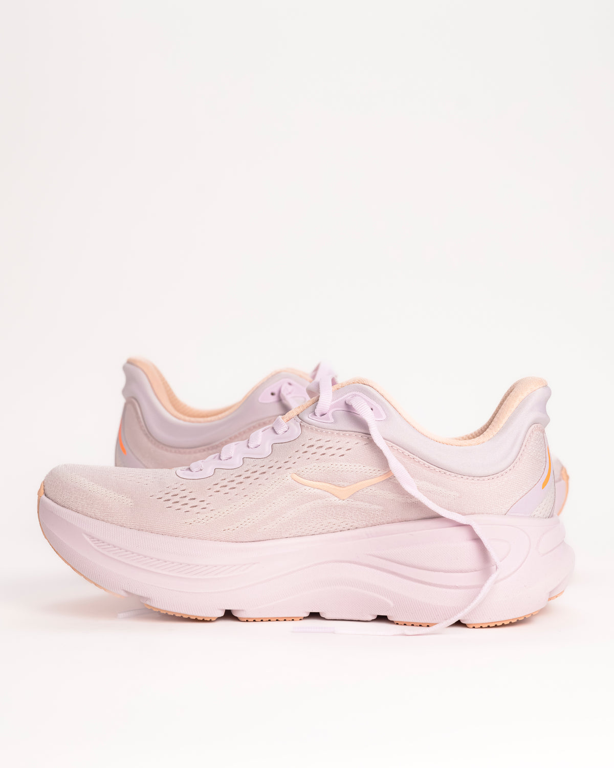 Women’s HOKA Bondi 9 – Max-Cushioned Running Shoe in Lilac Cream / Tangerine, Peachy Pink colorway with bright tangerine accents. 1162012-LRMT