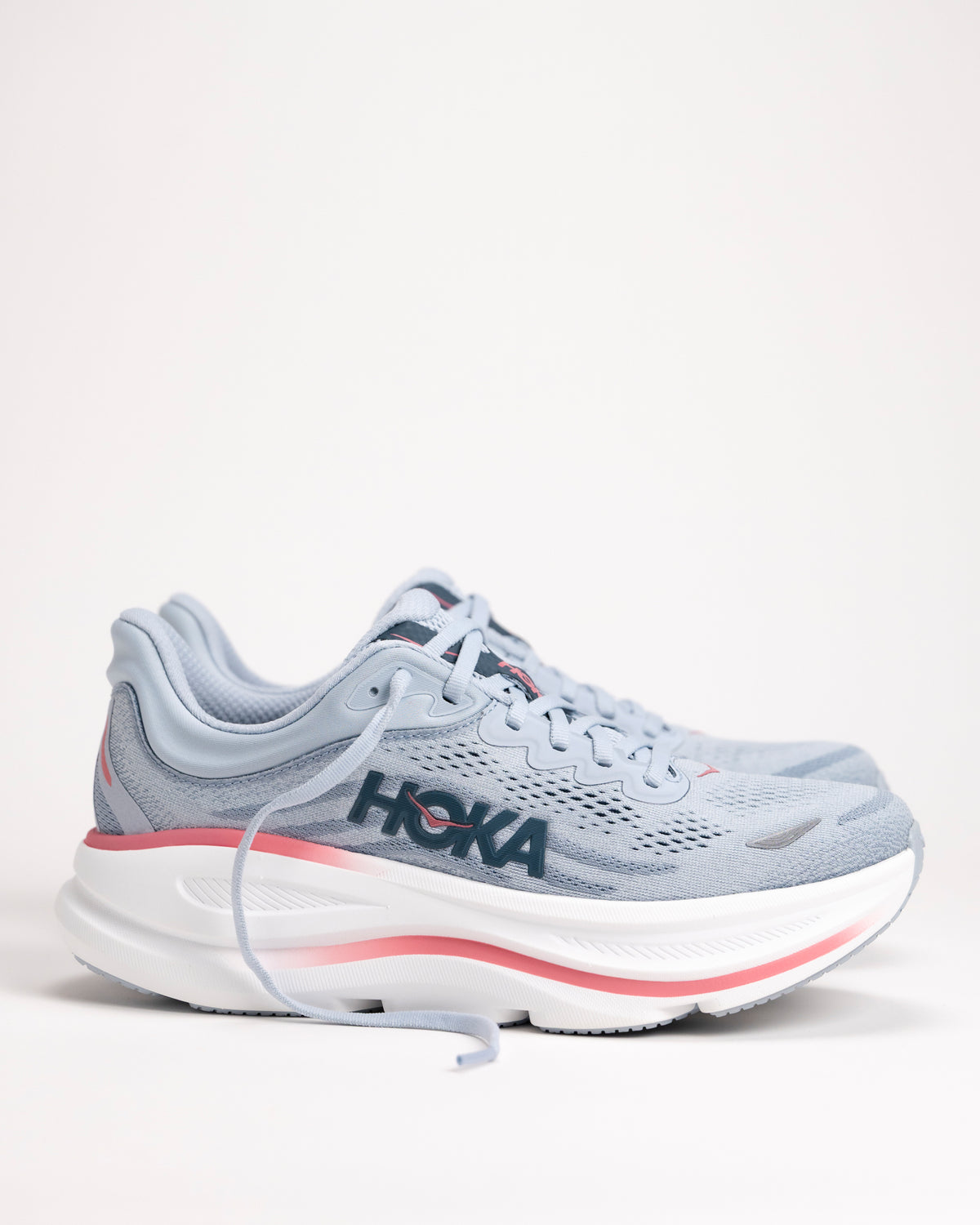 Side view of Women’s HOKA Bondi 9 in Mineral/Wash Blue showing high stack supercritical EVA foam