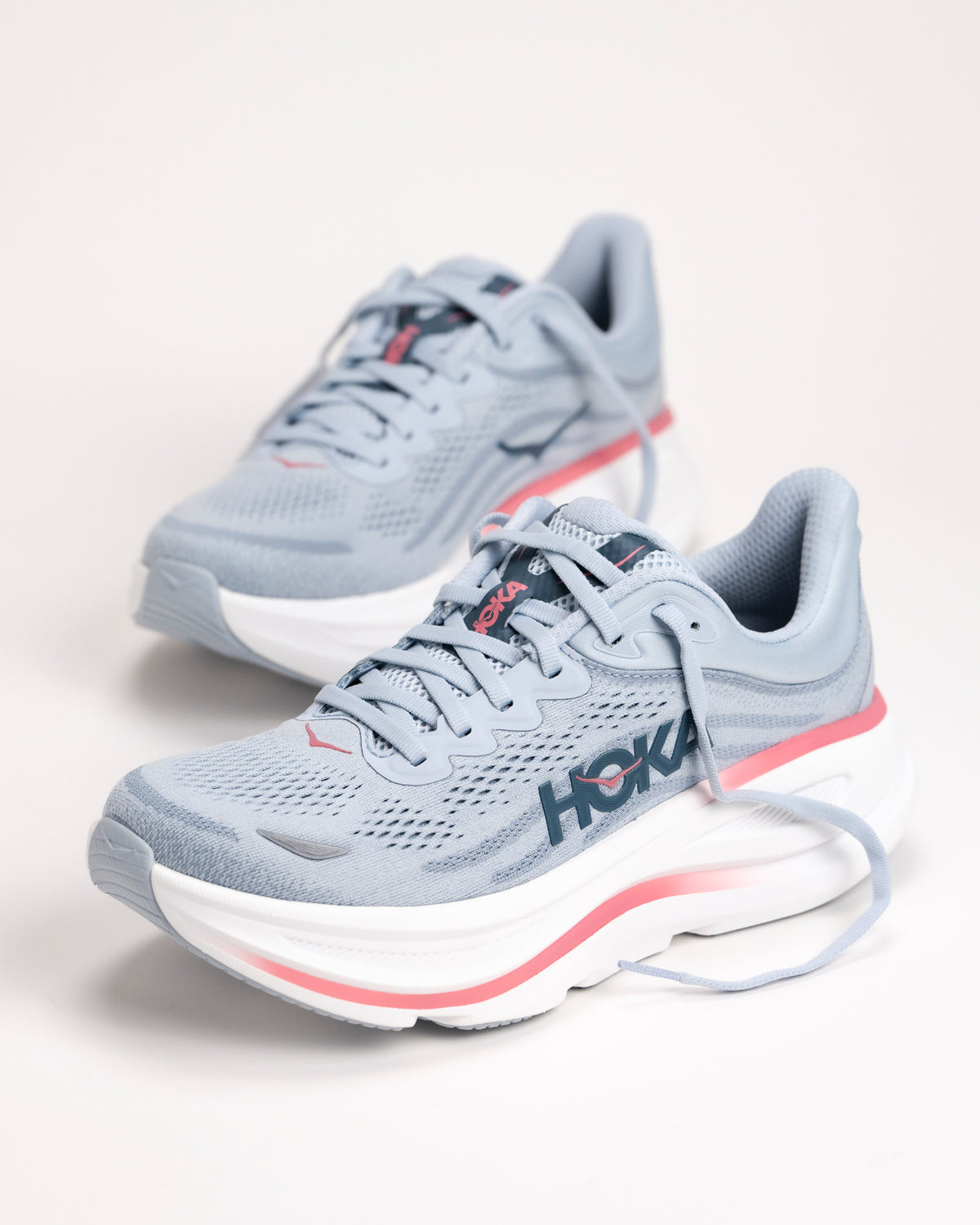 Angled shot of HOKA Bondi 9 Mineral/Wash Blue highlighting smooth MetaRocker™ geometry