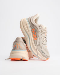 Women’s HOKA Bondi 9 – Max-Cushioned Running Shoe in River Rock Grey / Mineral Ore - 1162012-RRYM