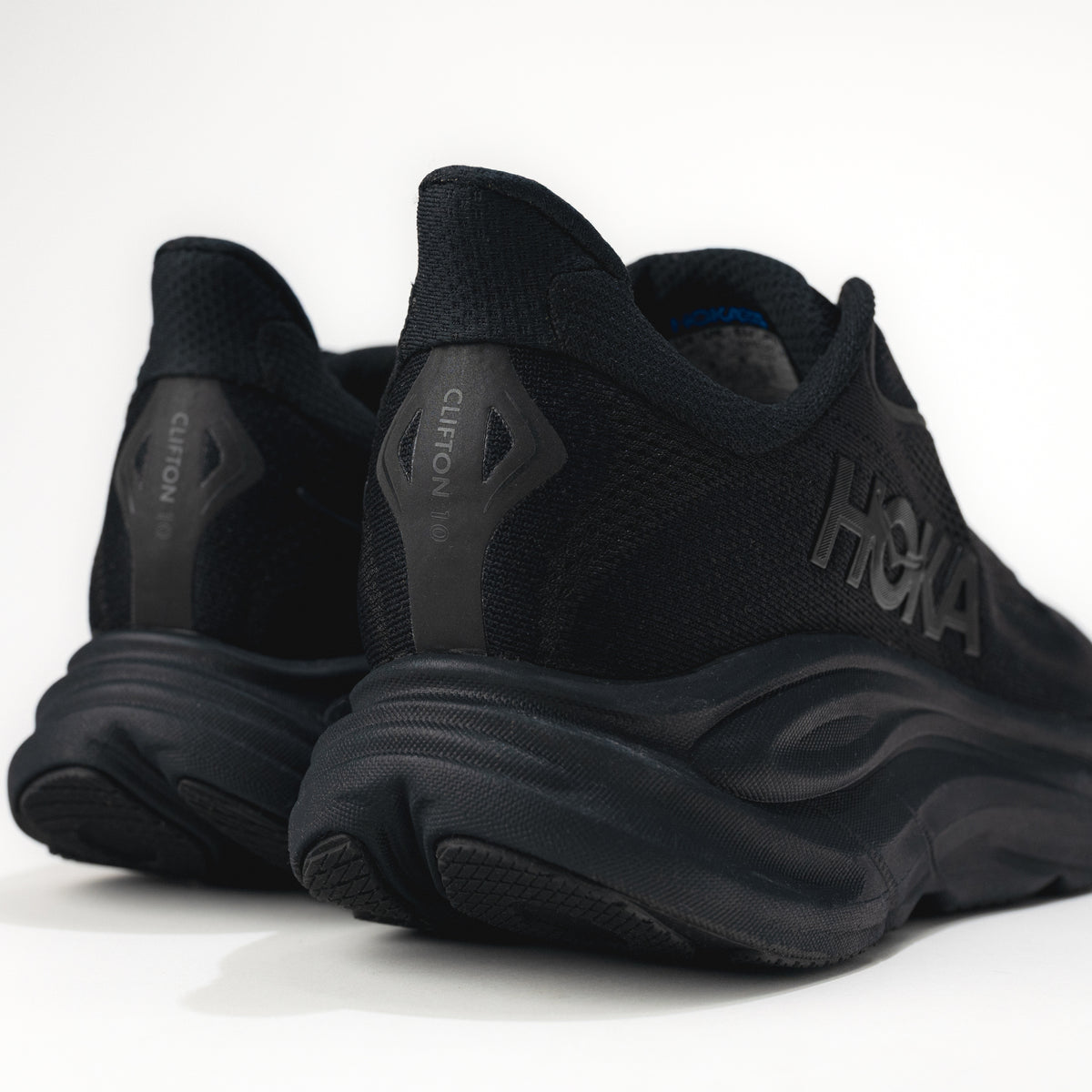 Black Hoka running shoes on a white background.
Men's HOKA Clifton 10 Lightweight Running Shoe in All Black