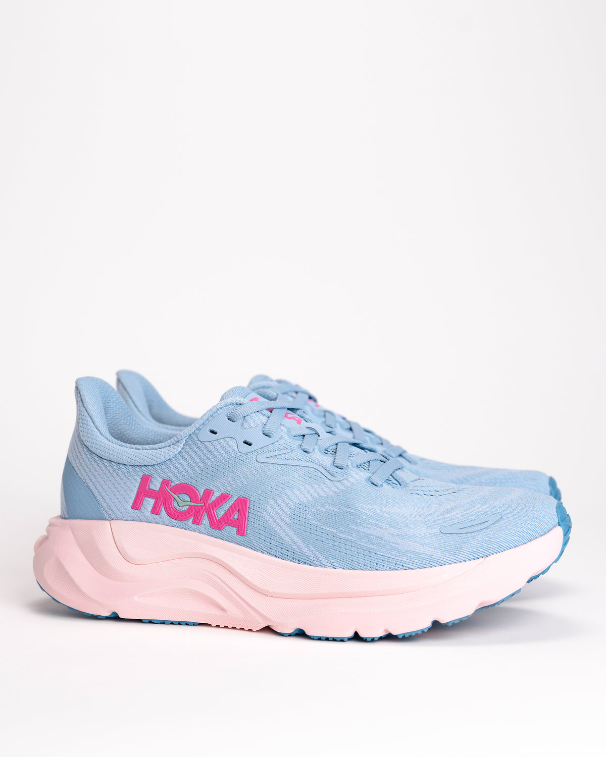 Blue HOKA Arahi 8 women's running shoe with pink sole on a white background. Drizzle/Petal colorway