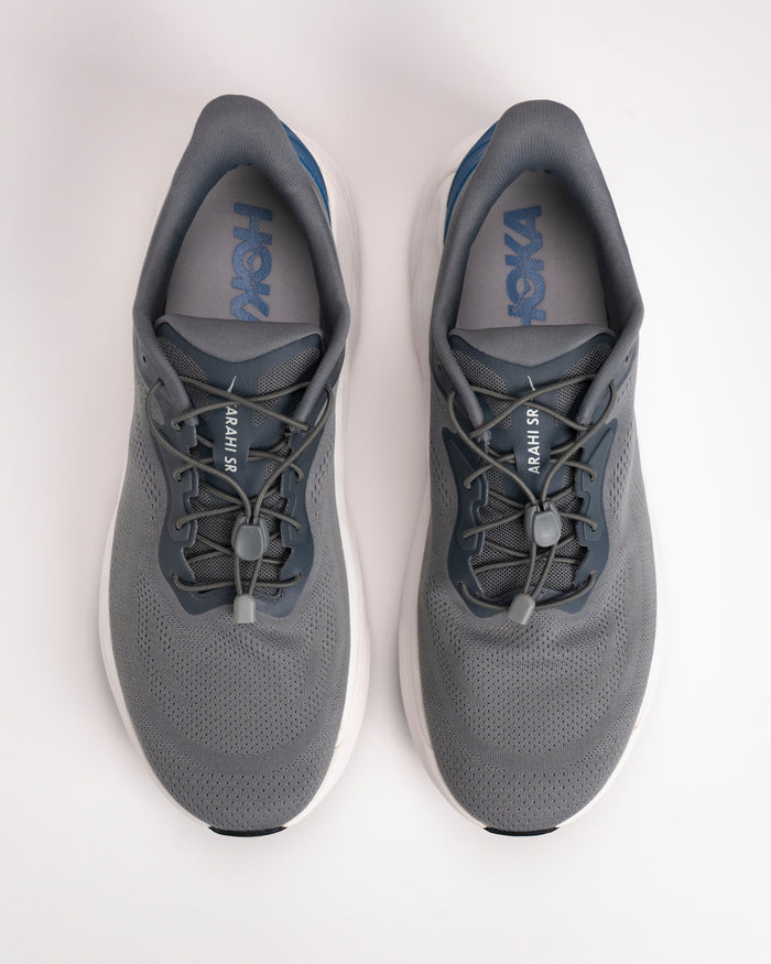 Top-down of HOKA Arahi SR breathable water-resistant mesh upper and toggle lace closure