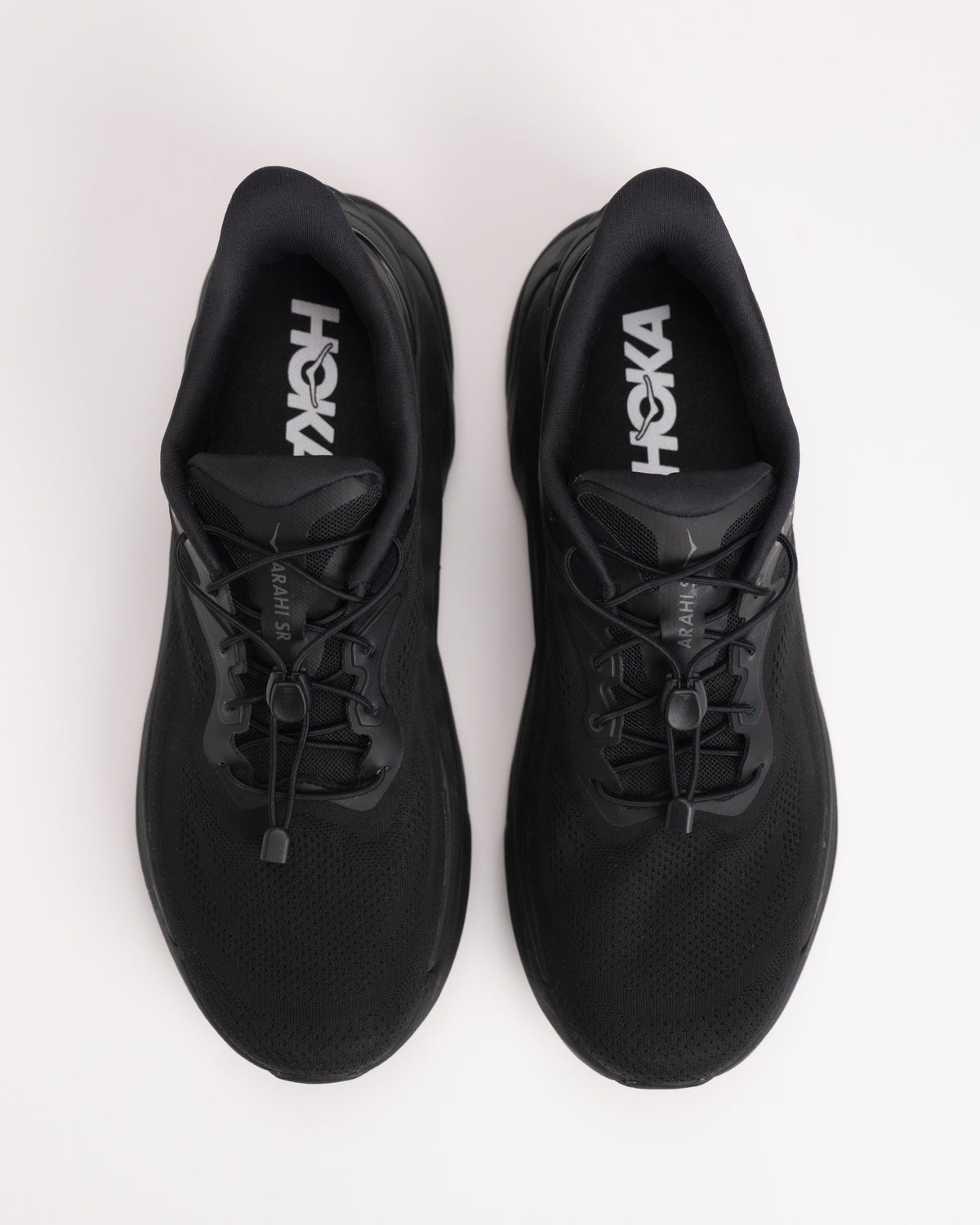 Top-down of HOKA Arahi SR breathable water-resistant mesh upper and toggle lace closure