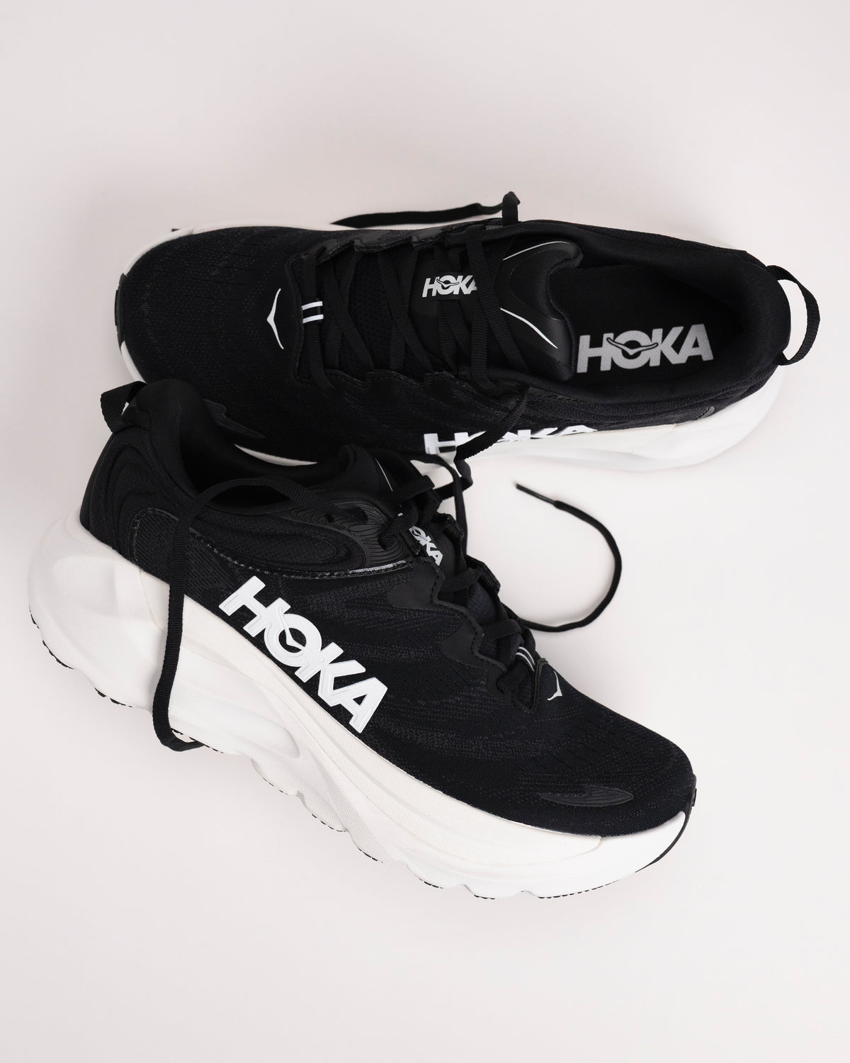Multi-angle shot of the Men’s HOKA Gaviota 6 in Black showing mesh upper detailing and internal lacing system