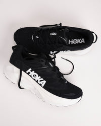 Multi-angle shot of the Men’s HOKA Gaviota 6 in Black showing mesh upper detailing and internal lacing system