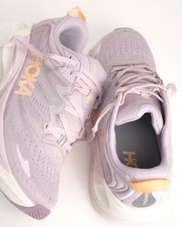The Women’s HOKA Gaviota 6 is designed for runners and walkers who want dependable stability paired with plush, confidence-building comfort. Built on a broad, cushioned platform, this supportive road running shoe delivers a smooth, balanced ride that feels steady underfoot without feeling stiff or restrictive. Lilac Cream / Fragrant Lilac