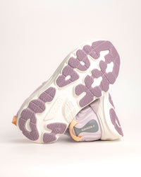 The Women’s HOKA Gaviota 6 is designed for runners and walkers who want dependable stability paired with plush, confidence-building comfort. Built on a broad, cushioned platform, this supportive road running shoe delivers a smooth, balanced ride that feels steady underfoot without feeling stiff or restrictive. Lilac Cream / Fragrant Lilac