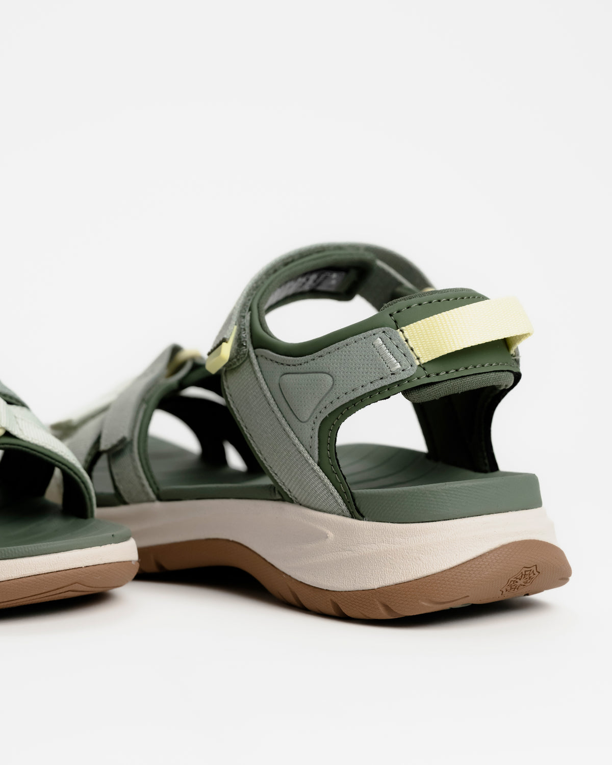 Women’s Teva Tirra Sport Hiking Sandal - Modernized Trail Comfort in Seagrass / Green with Spider Rubber outsole for grip on wet surfaces. Quick dry webbing straps with hook and loop adjustment and padded high-friction areas.