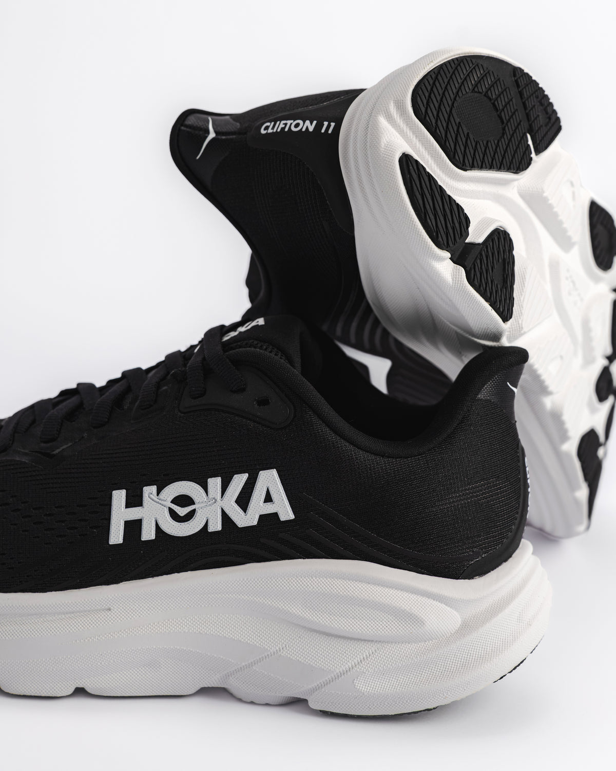 Women's HOKA Clifton 11 Running Shoe – Balanced Cushion Neutral Road Running in Black / White