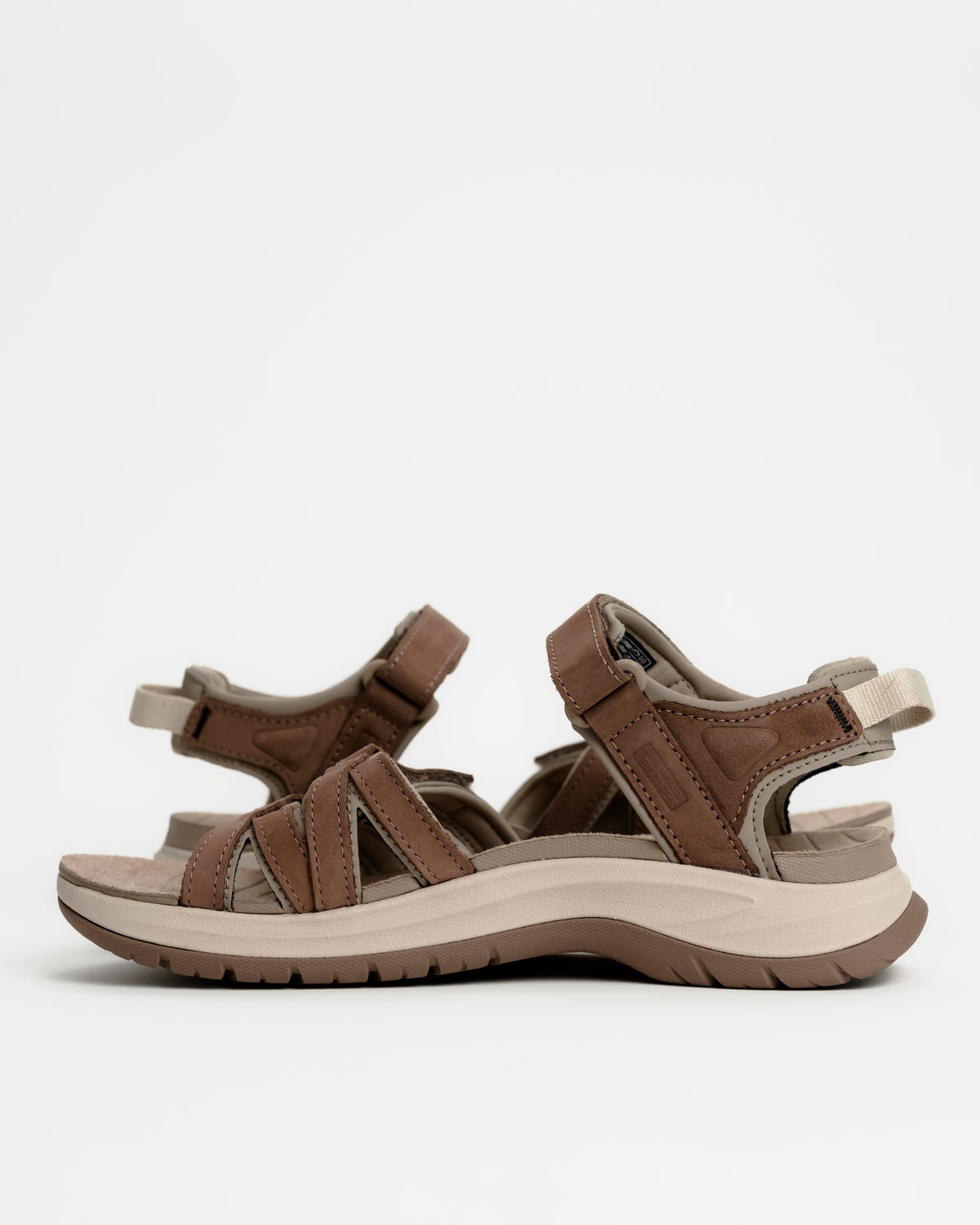 Women's Teva Tirra Sport Leather Hiking Sandal - Premium Multi-Terrain Support - Caribou / Brown. Great for rocky terrain and all-day travel walking.