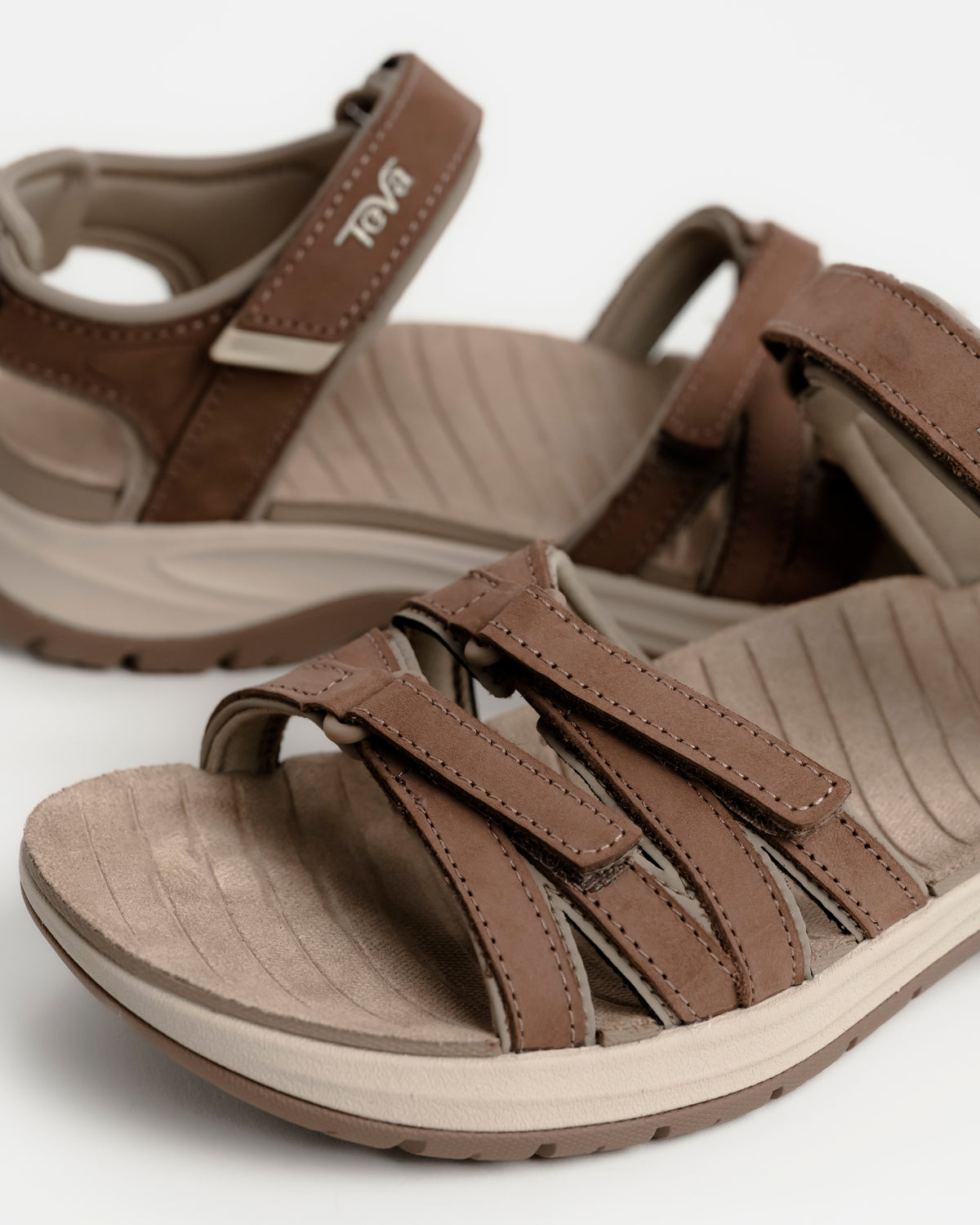 Women's Teva Tirra Sport Leather Hiking Sandal - Premium Multi-Terrain Support - Caribou / Brown. Great for rocky terrain and all-day travel walking.
