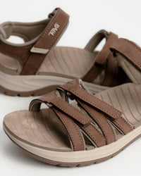 Women's Teva Tirra Sport Leather Hiking Sandal - Premium Multi-Terrain Support - Caribou / Brown. Great for rocky terrain and all-day travel walking.