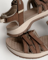 Women's Teva Tirra Sport Leather Hiking Sandal - Premium Multi-Terrain Support - Caribou / Brown. Great for rocky terrain and all-day travel walking.