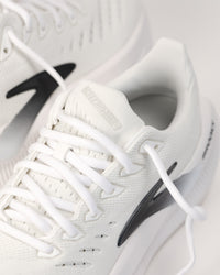 Lace-up and tongue detail shot of the Brooks Glycerin Max 2 lightweight cushioned shoe in White/Chateau Gray/Black 