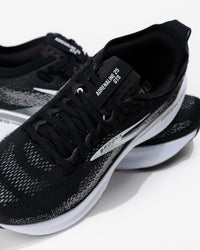 Detail upper view of the view of the Brooks Adrenaline GTS 25 showing padded collar and engineered mesh lacing system