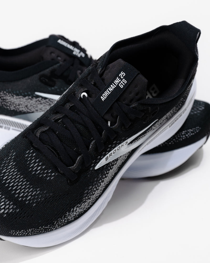 Detail upper view of the view of the Brooks Adrenaline GTS 25 showing padded collar and engineered mesh lacing system