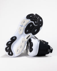 Durable rubber outsole of the women’s Adrenaline GTS 25 showing road-ready traction pattern