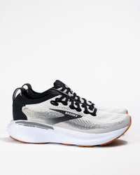 Side view of the Women's Brooks Adrenaline GTS 25 in White, Black, and Gum — supportive running shoe with GuideRails® stability system and engineered mesh upper.