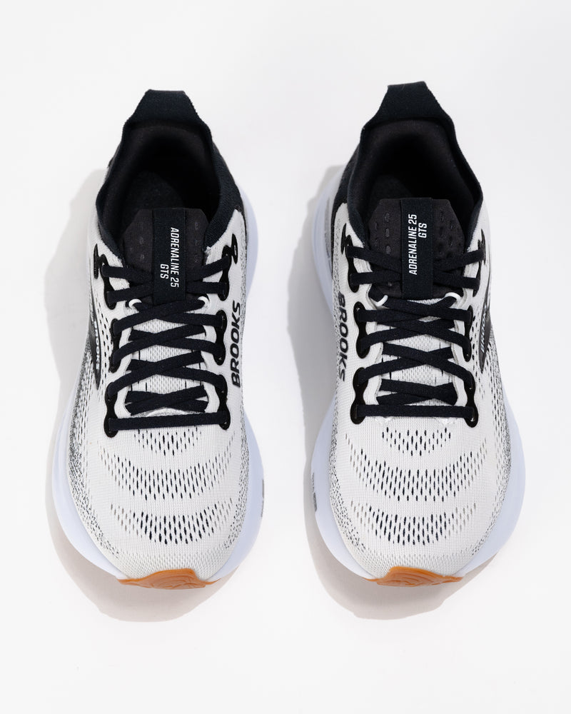Top-down view of Brooks Adrenaline GTS 25 running shoes showing laced black tongue, breathable mesh upper, and cushioned collar.
