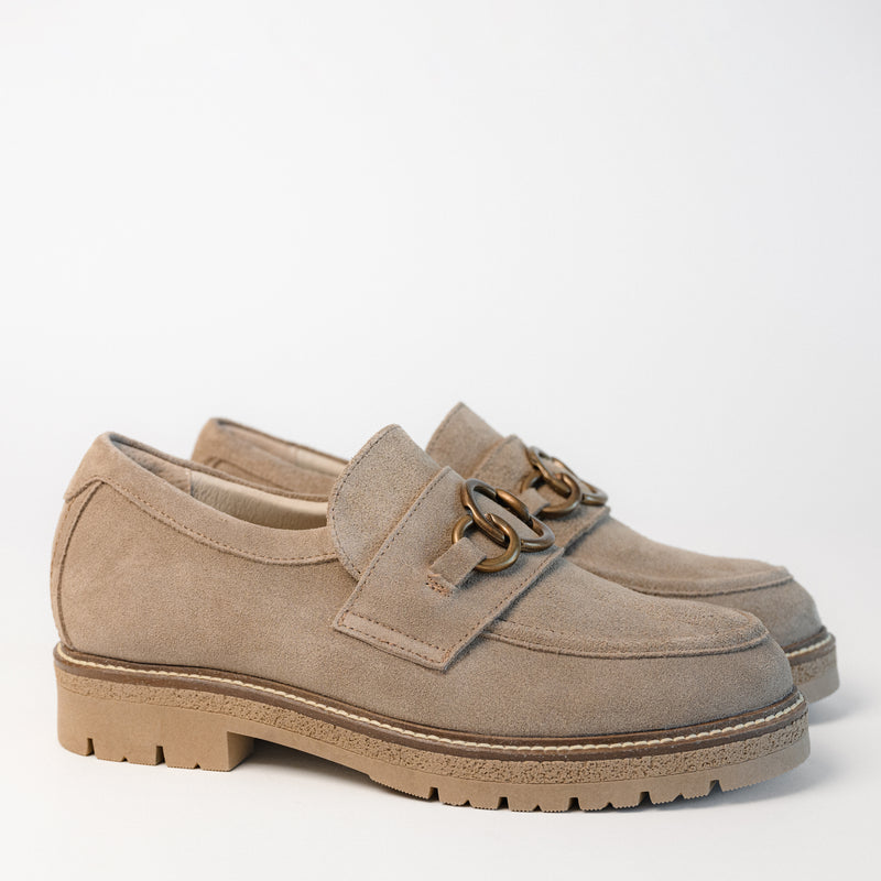 Side view of the Fremont loafer by Naot, featuring a 1.5" sturdy rubber heel and soft Almond suede upper.