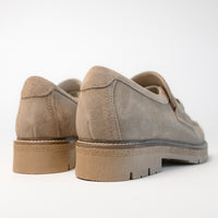 Back heel view showcasing the soft suede upper and 1.5" sturdy rubber heel on this comfy Women's loafer.