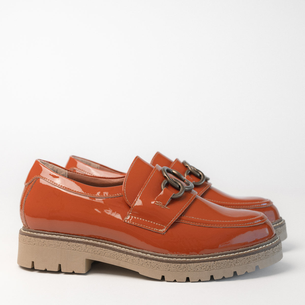 Side profile of the Burnt Orange Fremont loafer, boasting a durable 1.5" short rubber heel.