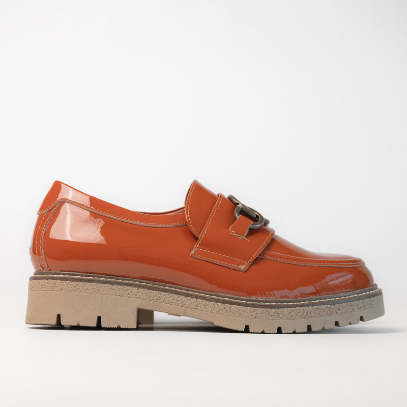 Side profile of the Burnt Orange Fremont loafer, boasting a durable 1.5" short rubber heel.