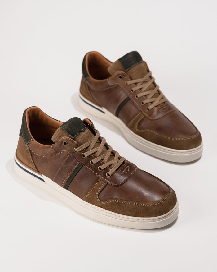 Top-down look showing laces, padded tongue, and layered toe design or the Naot Swift.