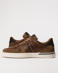 Instep view showing stitching detail and midsole design of the Naot Swift