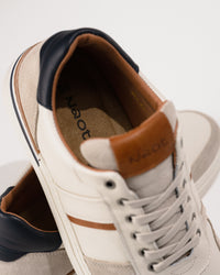 Orthotic-friendly removable footbed with cushion and arch support and plush padded tongue. 