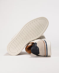 Outsole detail showing the textured, slip-resistant tread.