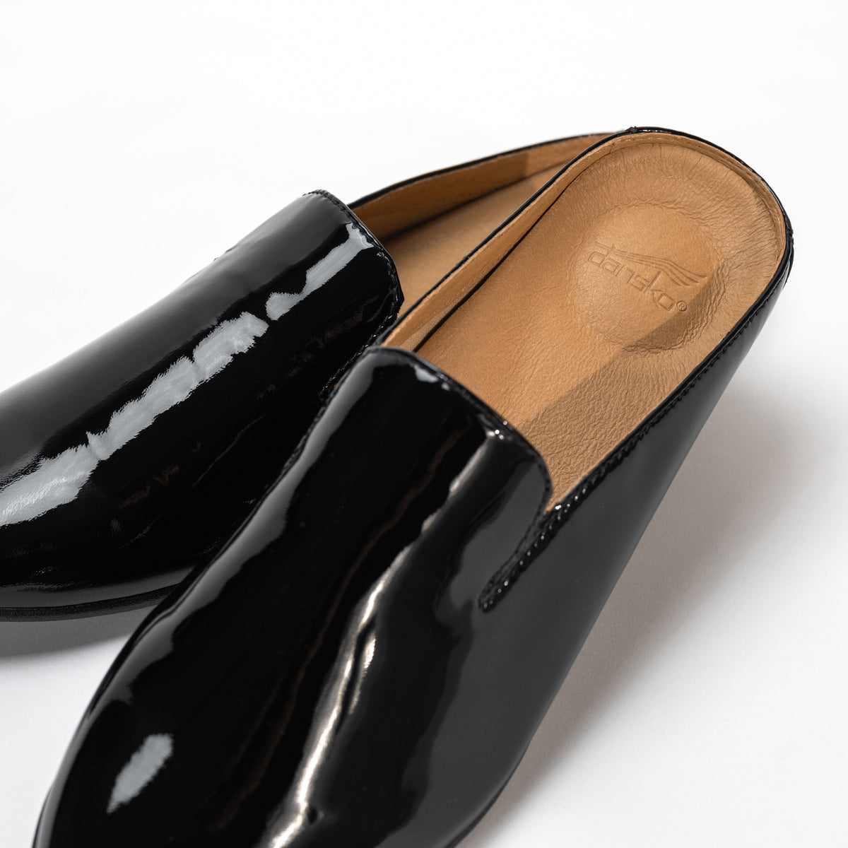 Detailed view of removable EVA footbed with Dansko Natural Arch® technology.