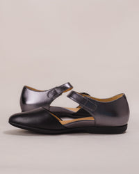 Side shot focusing on the outer instep and flexible leather upper.