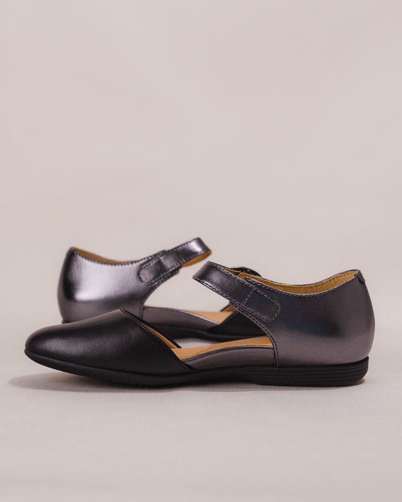 Side shot focusing on the outer instep and flexible leather upper.