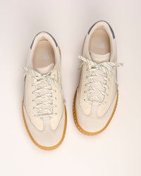 Top view of SOREL Ona Ave T-Toe Chalk / Grey Ash beige sneaker showing leather and suede upper.