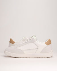 Pair of Women’s SOREL Ona Drift sneakers in Sea Salt white on white background