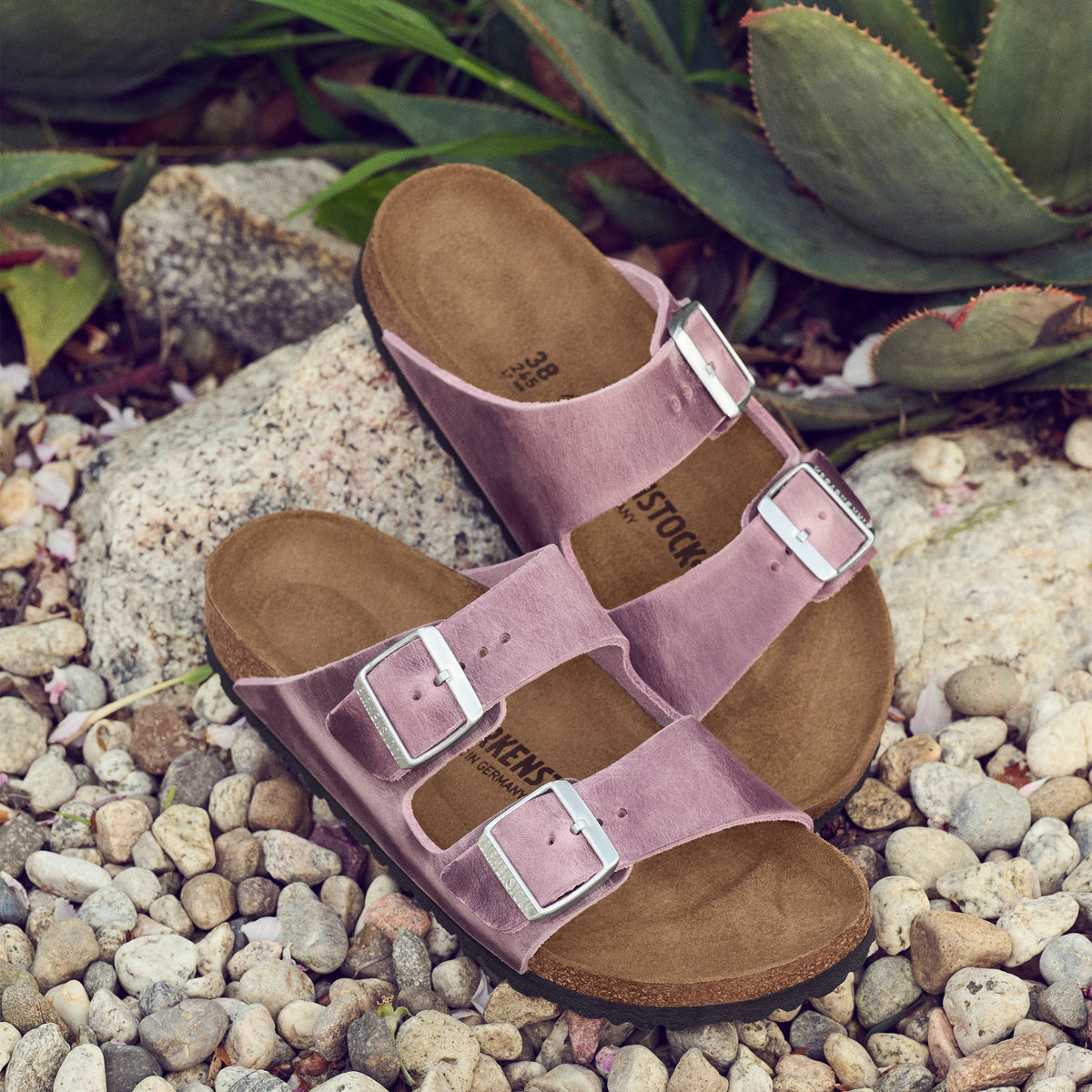 Detail of the suede-lined footbed and Lavender purple oiled leather in the Birkenstock Arizona Sandal, designed for custom support and long-lasting comfort.