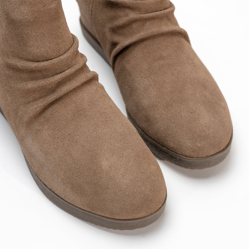 Overhead view of the Stephanie Boot’s slouch waterproof suede upper and rounded toe.