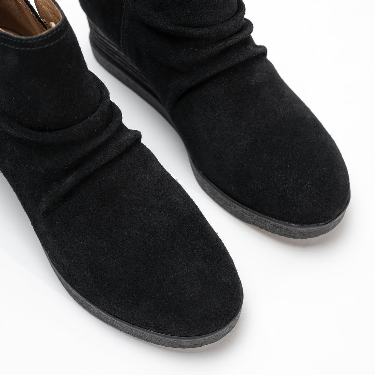 Overhead view of the Stephanie Boot’s slouch suede upper and rounded toe.