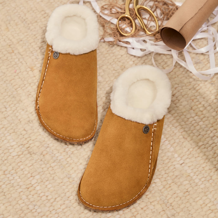 Overhead view of Premium Birkenstock Zermatt slipper in Mink suede with cozy genuine shearling lining featuring contrasting stitch, logo hardware detail and cork-latex footbed.